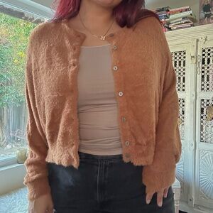 extremely soft burnt orange cardigan from free people!!